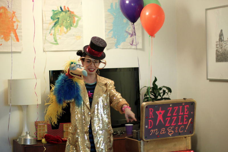 NYC magician Razzle Dazzle with puppet at birthday party